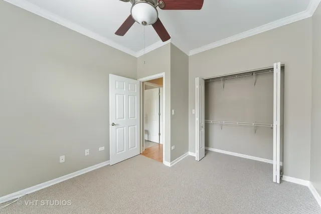an empty room with fan
