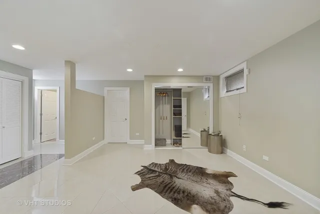 a room with a bed and a window