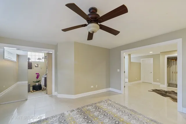 a view of livingroom with hardwood floor and ceiling fan