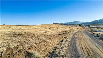 a view of an outdoor space and a mountain view
