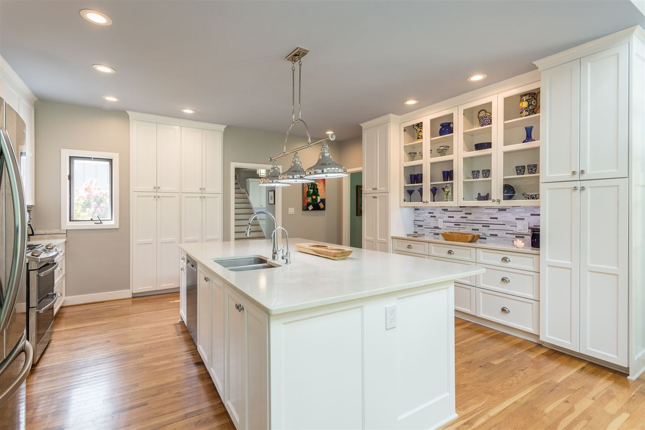 4409 Wood Valley Drive Raleigh, NC 27613 - Photo 11 of 30 The organization of this kitchen will impress you and offers abundant storage! It will be hard to fill all of these cabinets! Multiple Pull Out Drawers in Cabinets
