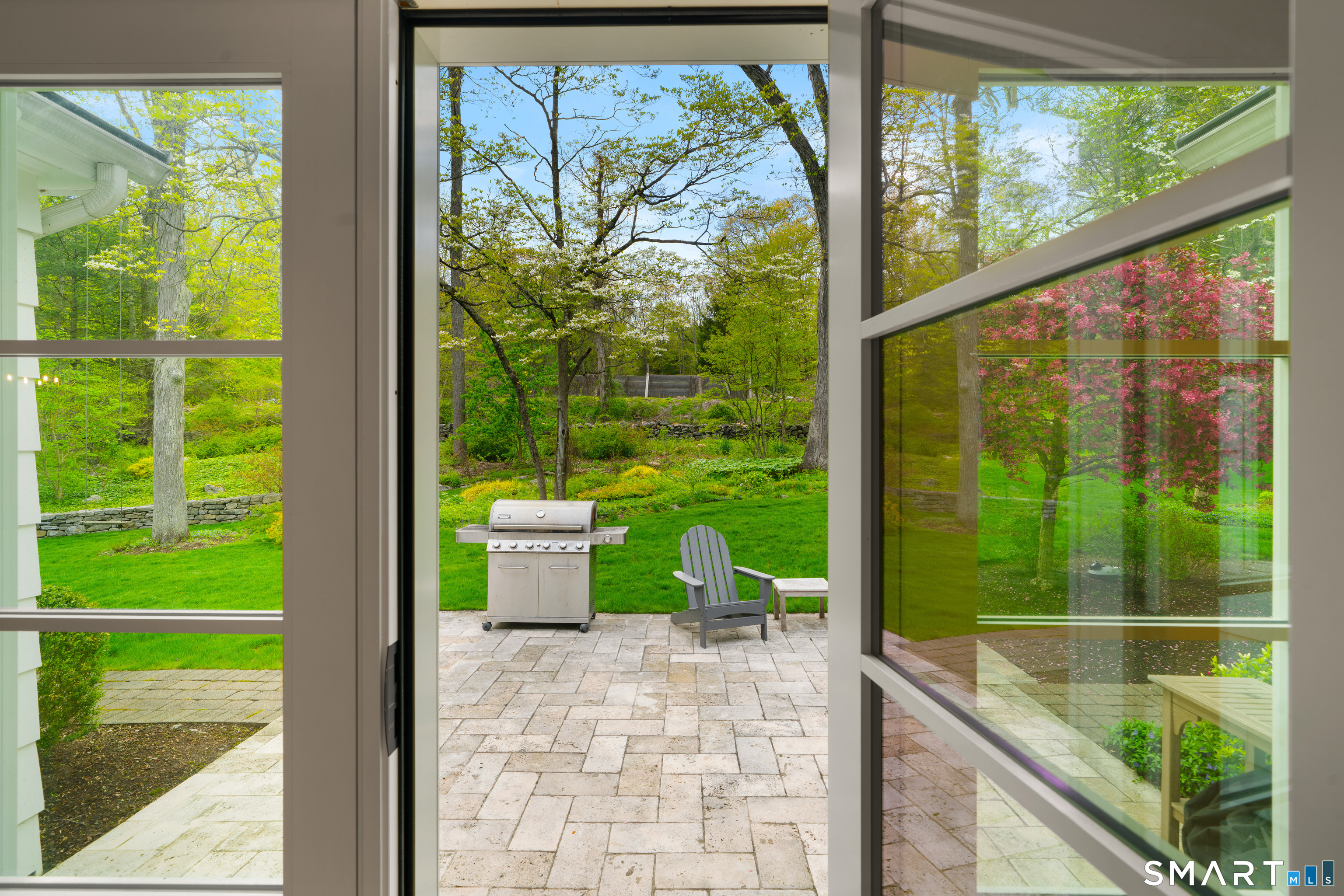 23 Norton Road Easton, CT 06612 - Photo 9 of 40 Amazing view from the kitchen out to the backyard stone patio.