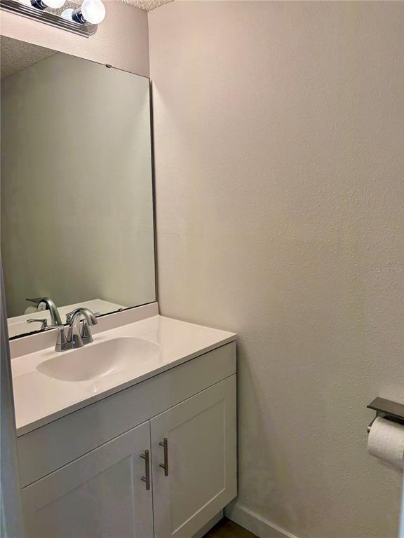 1455 Ridge Lake Court Lakeland, FL 33801 - Photo 7 of 15 a bathroom with a sink and vanity