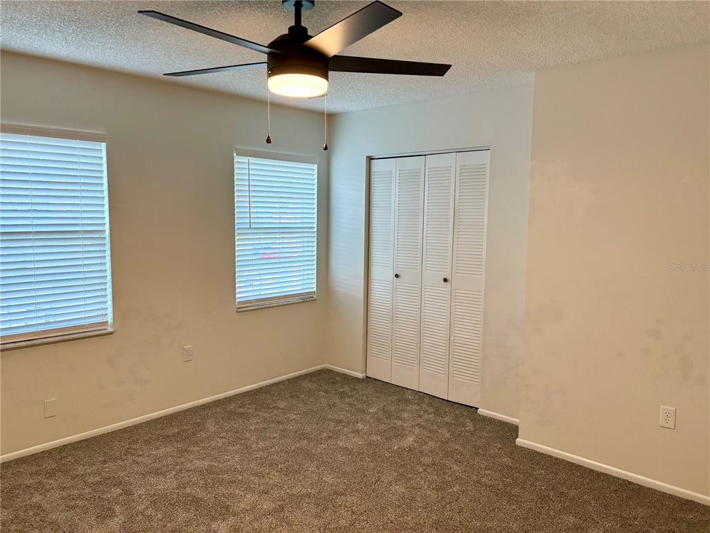 1455 Ridge Lake Court Lakeland, FL 33801 - Photo 10 of 15 a view of an empty room with a window