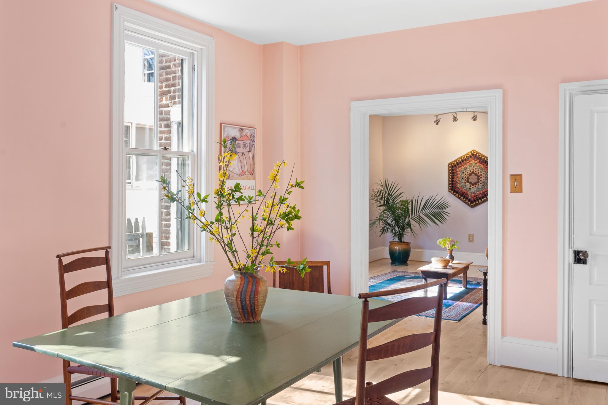 254 Chestnut Street Spring City, PA 19475 - Photo 12 of 37 a view of a dining room with furniture and a potted plant