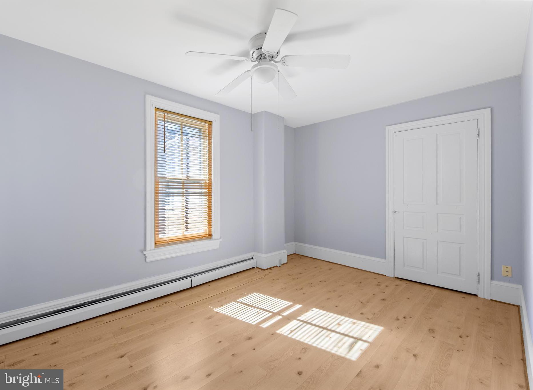 254 Chestnut Street Spring City, PA 19475 - Photo 19 of 37 wooden floor in an empty room with a window
