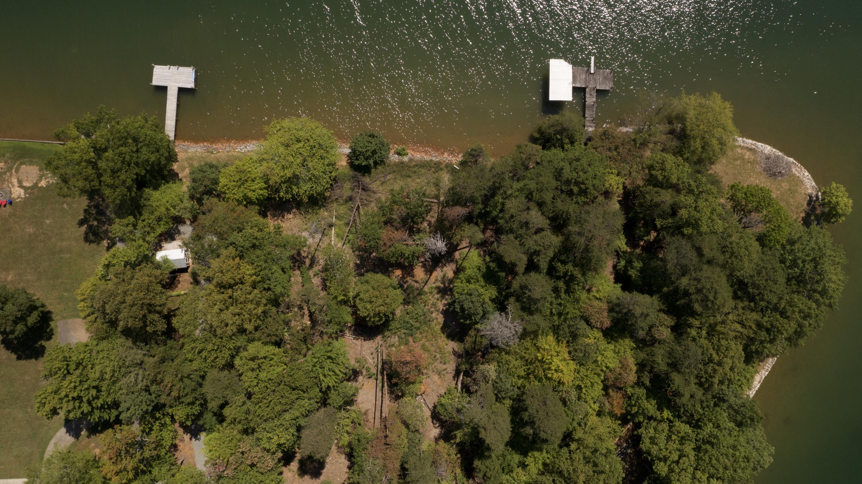 Lot 2 Sigh N Pine Road Huddleston, VA 24104 - Photo 3 of 9 a view of a lake with a building