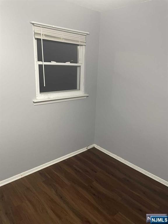 60 Maiden Lane, Unit 2 Little Ferry, NJ 07643 - Photo 15 of 22 a small space with wooden floor and a window