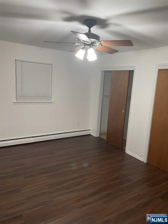 60 Maiden Lane, Unit 2 Little Ferry, NJ 07643 - Photo 19 of 22 a view of an empty room with wooden floor and a ceiling fan