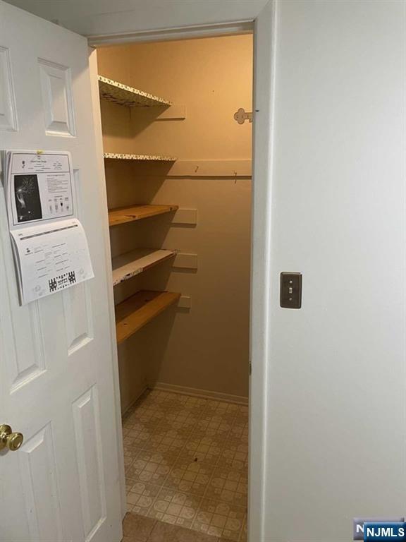 60 Maiden Lane, Unit 2 Little Ferry, NJ 07643 - Photo 5 of 22 a view of a walk in closet
