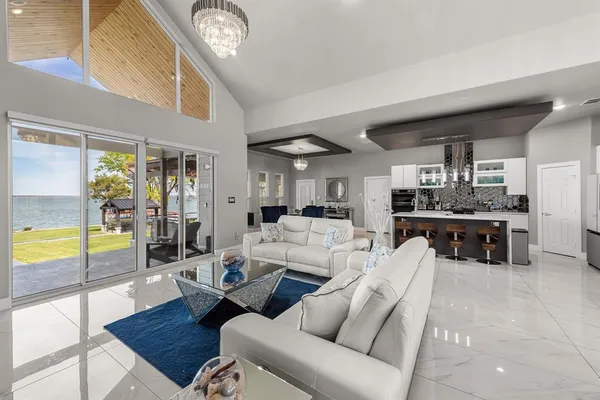 a living room with furniture and a table