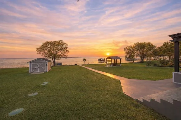 a view of a field with clear sky