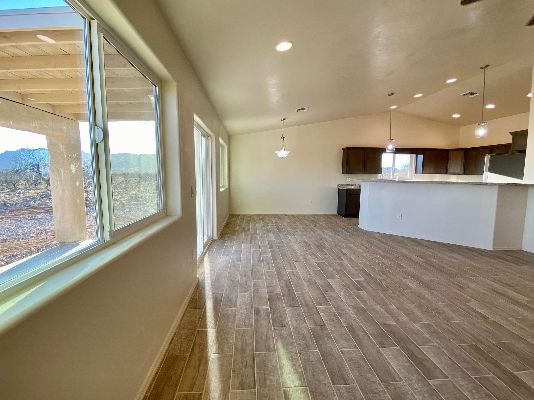77 Ver Patria Rio Rico, AZ 85648 - Photo 15 of 50 a view of a large kitchen with a large window