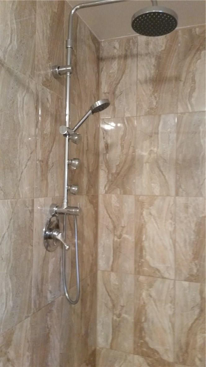 9711 North New River Canal Road, Unit 212 Plantation, FL 33324 - Photo 25 of 41 a bathroom with a shower