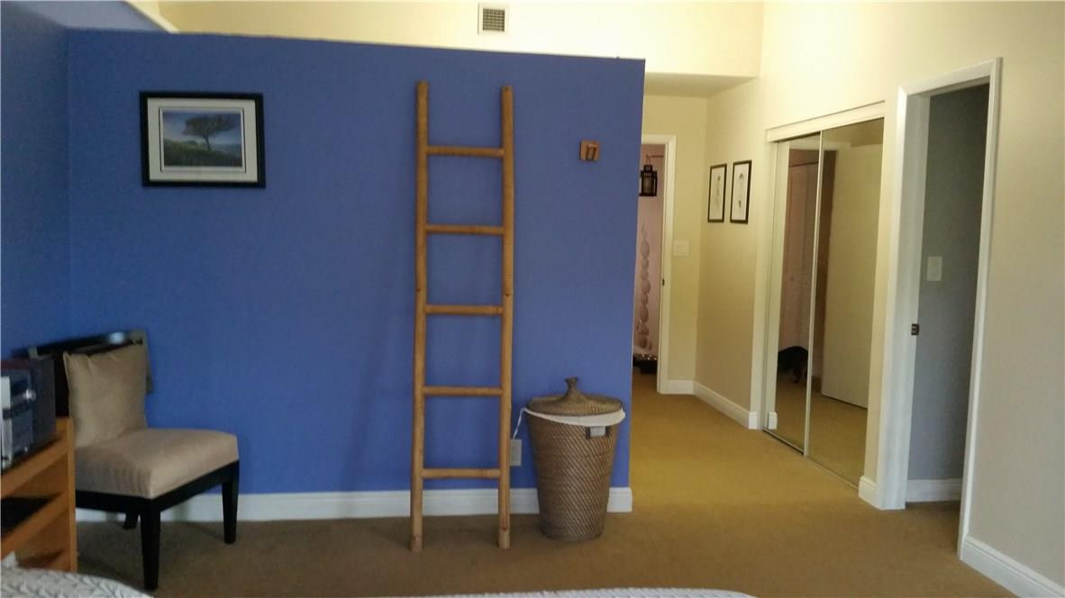 9711 North New River Canal Road, Unit 212 Plantation, FL 33324 - Photo 29 of 41 a view of a room with a chair
