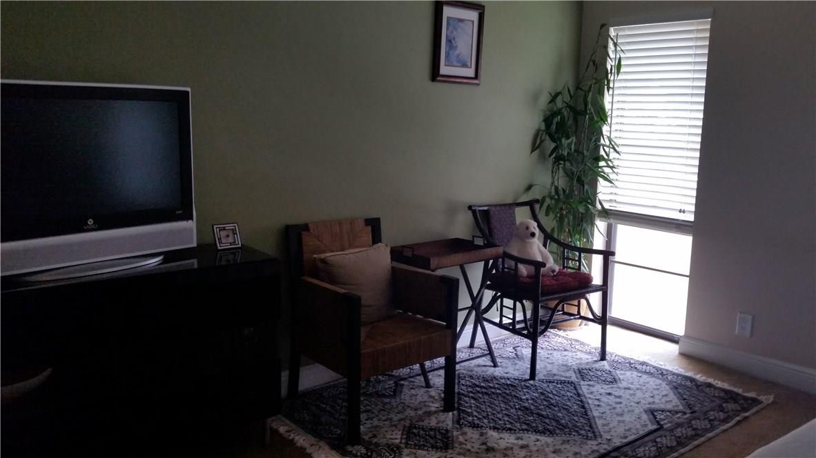 9711 North New River Canal Road, Unit 212 Plantation, FL 33324 - Photo 32 of 41 a view of a livingroom with furniture