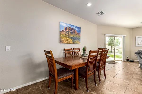 a view of a dining room with furniture