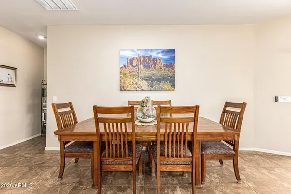 a view of a dining room with furniture