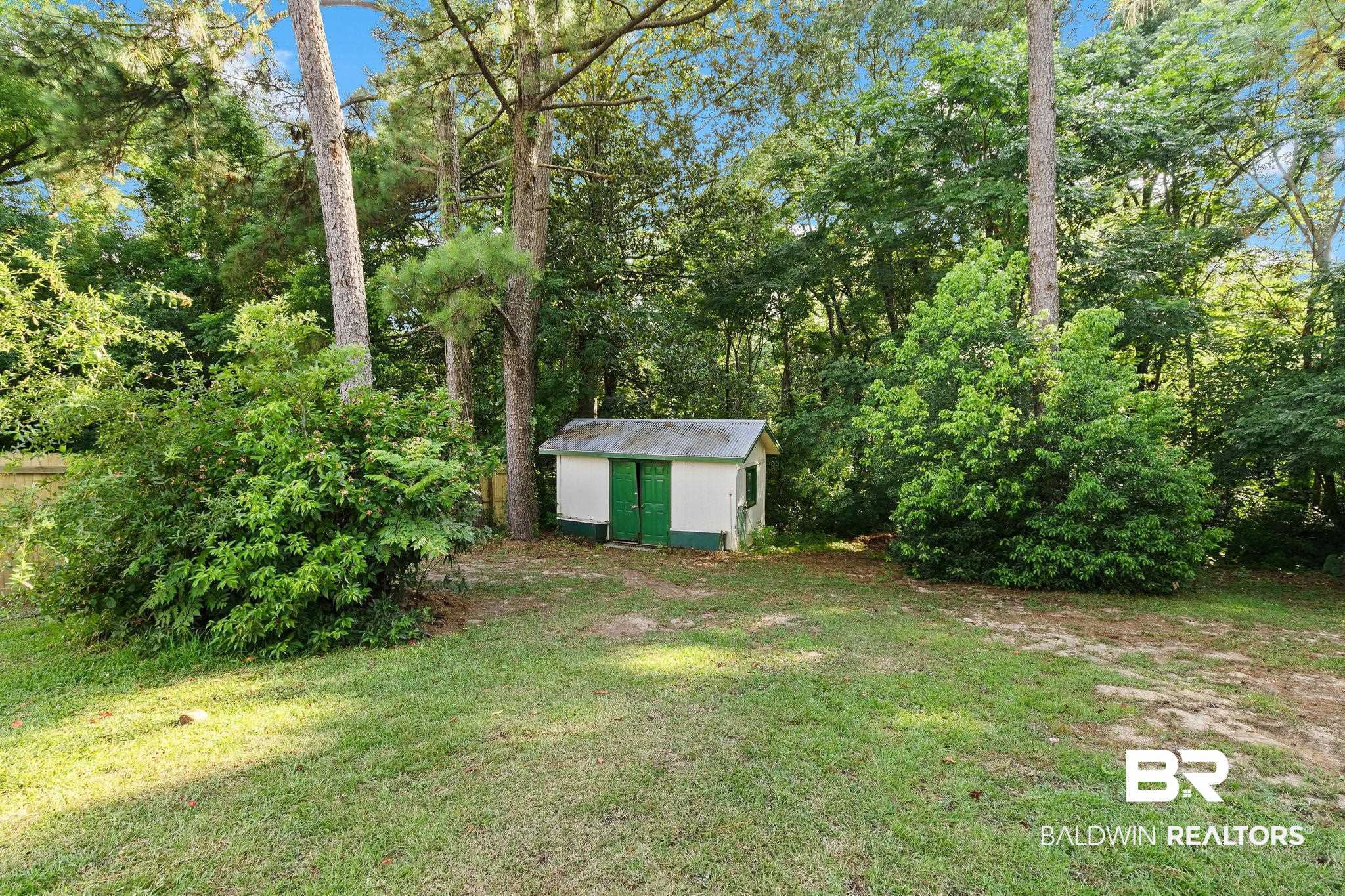 14 Lee Circle Daphne, AL 36527 - Photo 72 of 83 View of yard featuring a storage shed