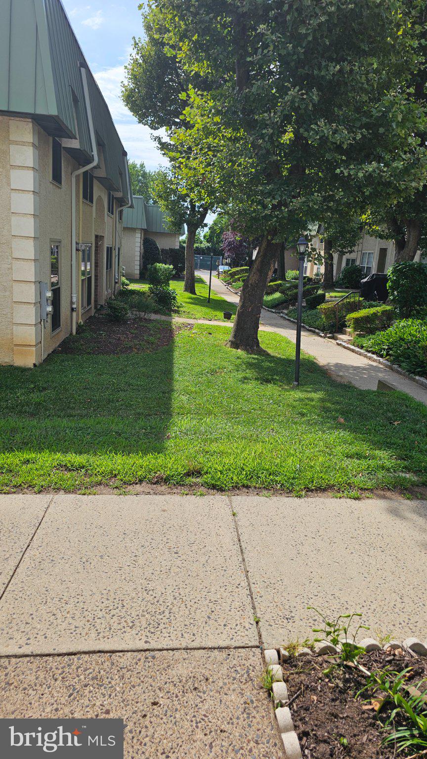 441 Tomlinson Road, Unit H1 Philadelphia, PA 19116 - Photo 7 of 31 Lush greenery and inviting pathways.
