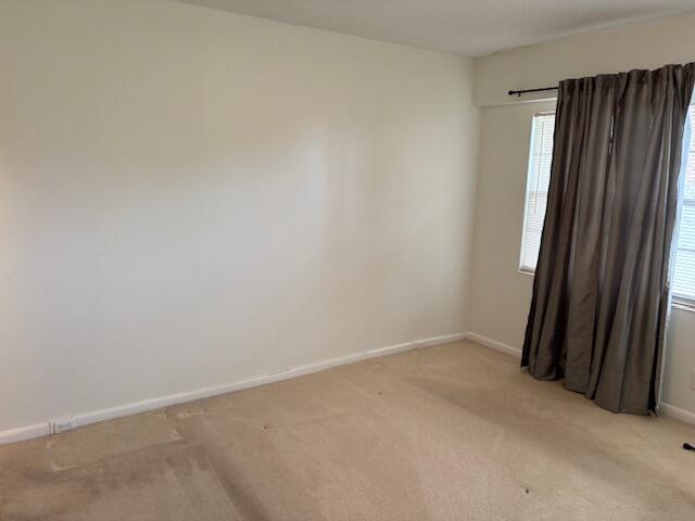 35 Mansfield A, Unit 35 Boca Raton, FL 33434 - Photo 11 of 17 an empty room with a window