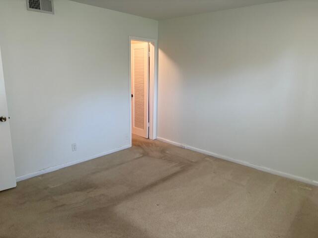 35 Mansfield A, Unit 35 Boca Raton, FL 33434 - Photo 12 of 17 an empty room with windows
