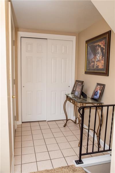 981 Colonial Manor Road North Huntingdon, PA 15642 - Photo 14 of 20 Ceramic tile entry from the garage with coat closet.