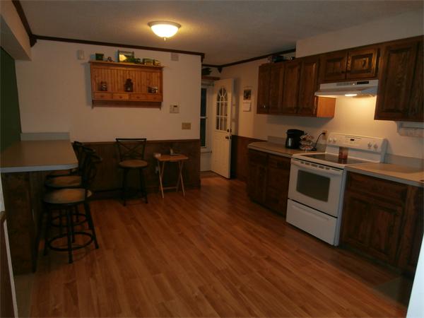 2279 Barre Road Hardwick, MA 01037 - Photo 8 of 25 a kitchen with stainless steel appliances a stove a sink dishwasher and a refrigerator