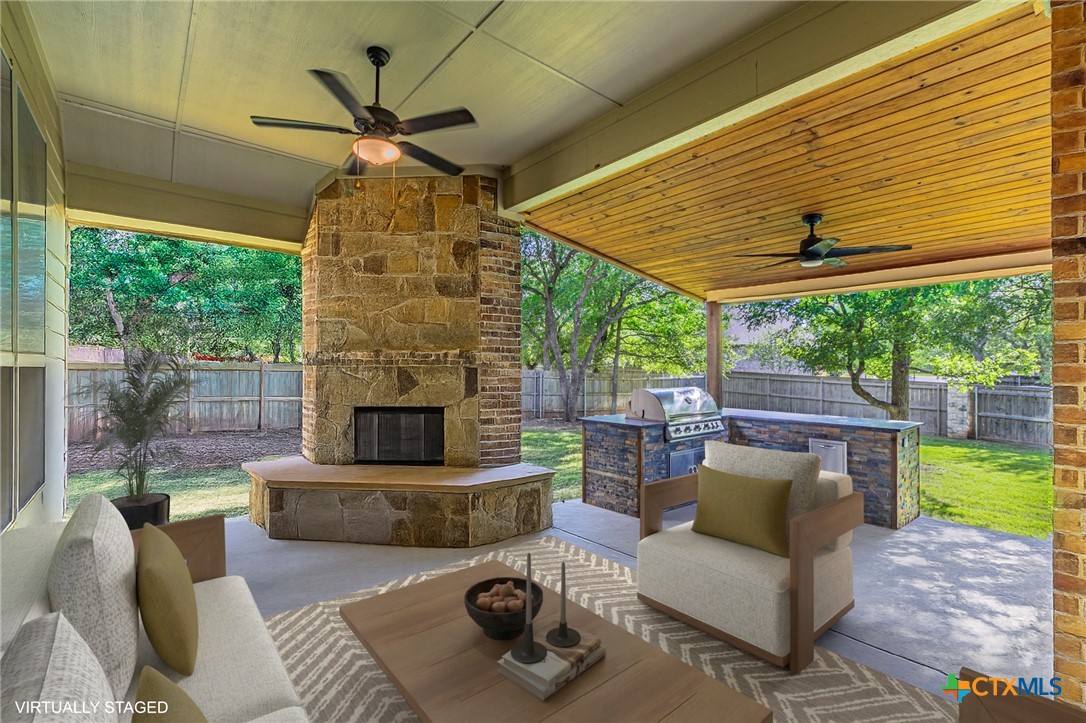 8 Daingerfield Cove Morgan's Point Resort, TX 76513 - Photo 28 of 28 a living room with furniture and a fireplace
