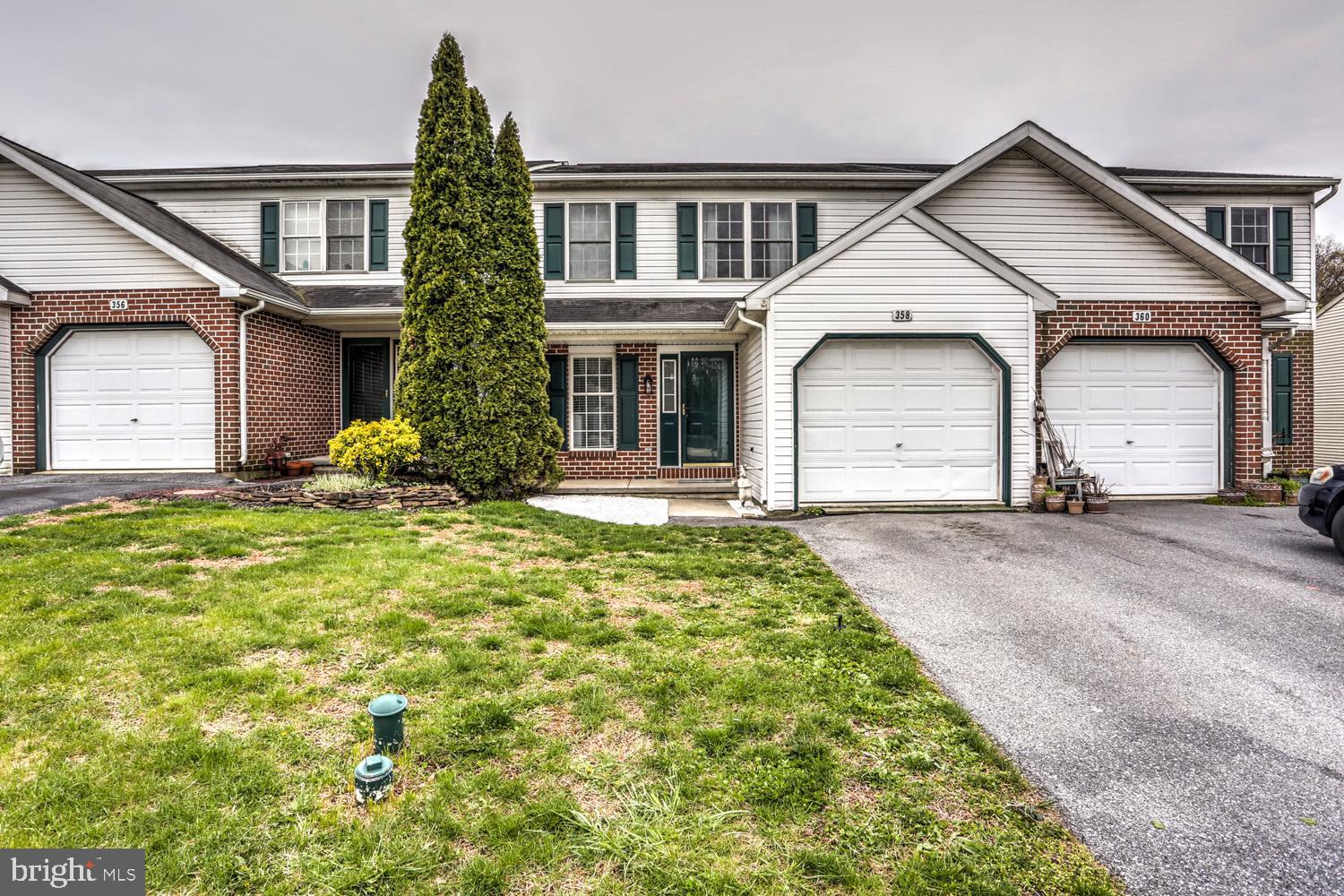 358 Crosswinds Drive Lititz, PA 17543 - Photo 1 of 39 a front view of a house with garden