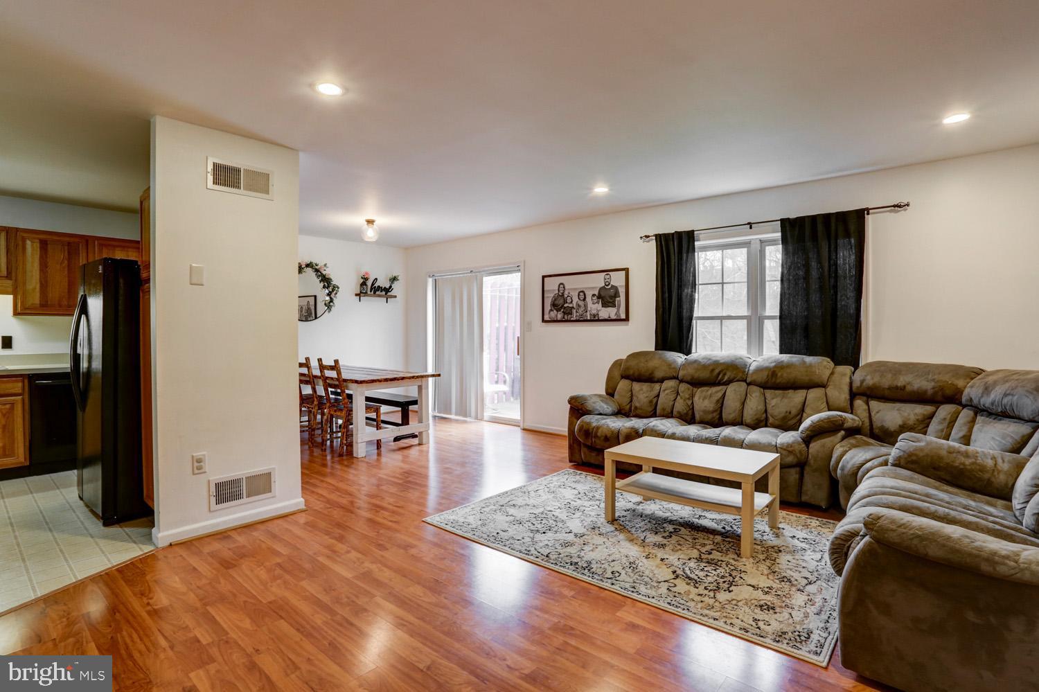 358 Crosswinds Drive Lititz, PA 17543 - Photo 20 of 39 a living room with furniture and a wooden floor