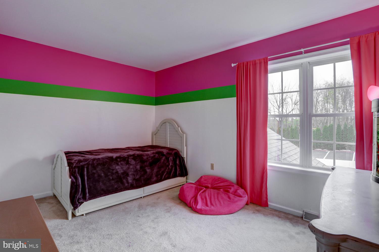 358 Crosswinds Drive Lititz, PA 17543 - Photo 24 of 39 a living room with a bed and a window