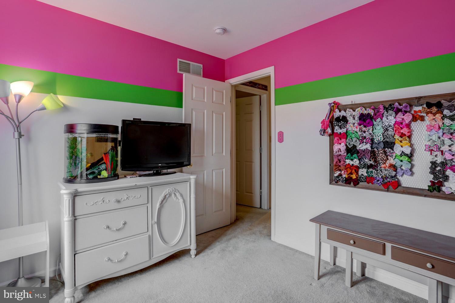 358 Crosswinds Drive Lititz, PA 17543 - Photo 25 of 39 a room with furniture and a flat screen tv
