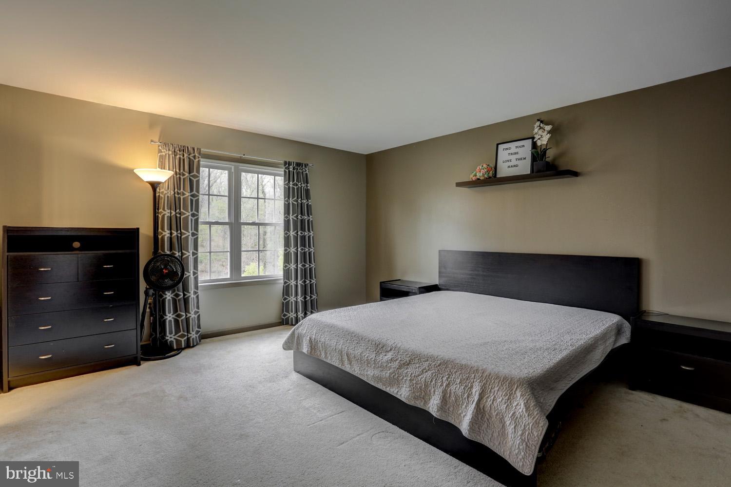 358 Crosswinds Drive Lititz, PA 17543 - Photo 30 of 39 a bedroom with a bed and a night stand