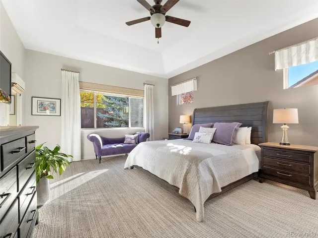 a bedroom with bed and a window