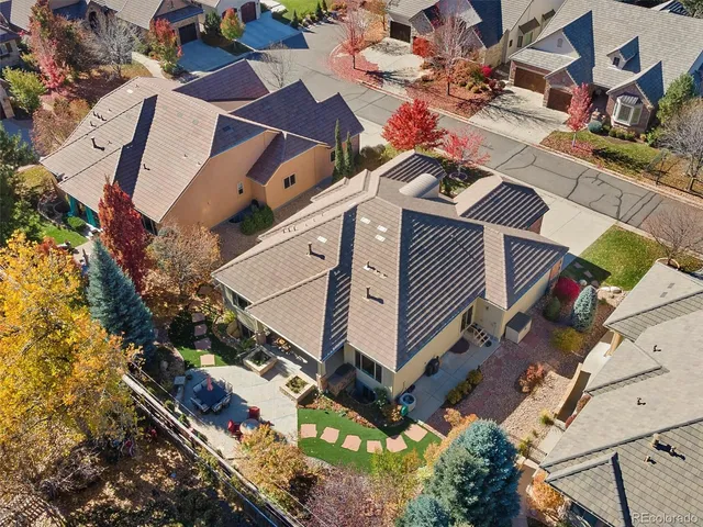 a view of yard with swimming pool and green space