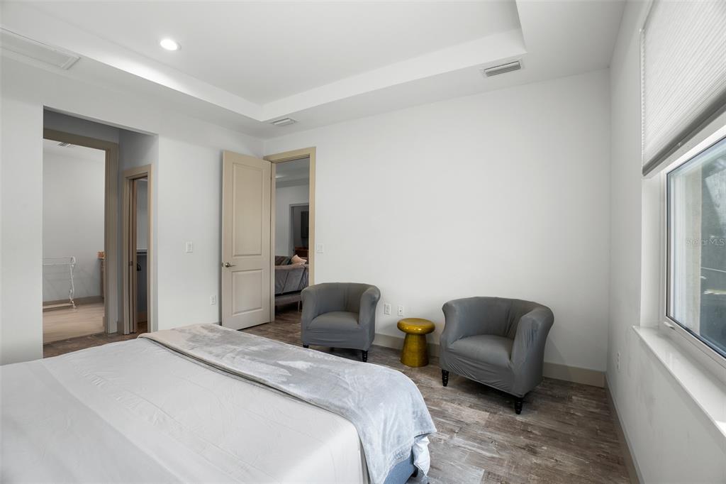 4528 Libby Road North Port, FL 34287 - Photo 22 of 43 a bedroom with bed couch and window