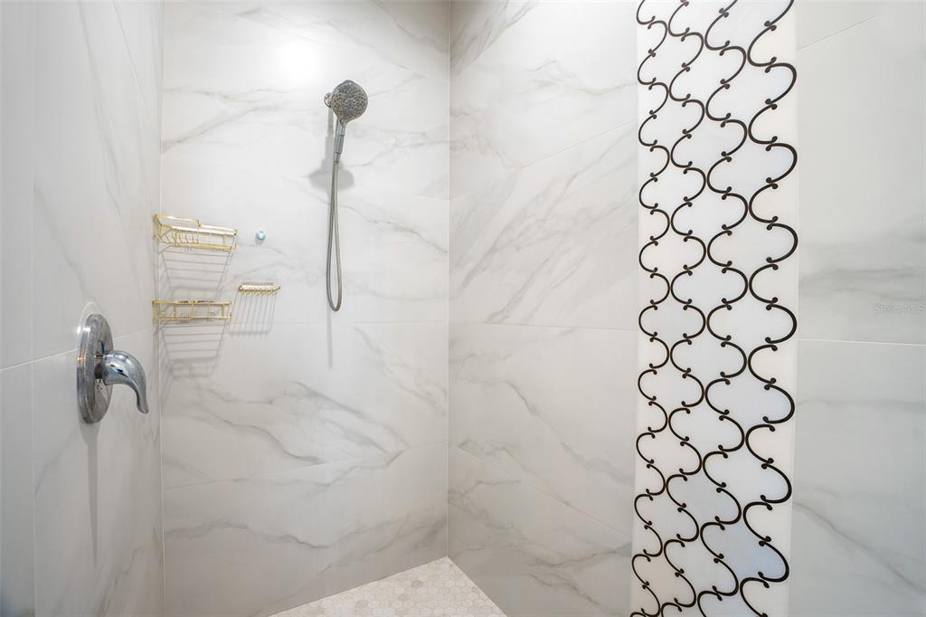 4528 Libby Road North Port, FL 34287 - Photo 23 of 43 a bathroom with a shower