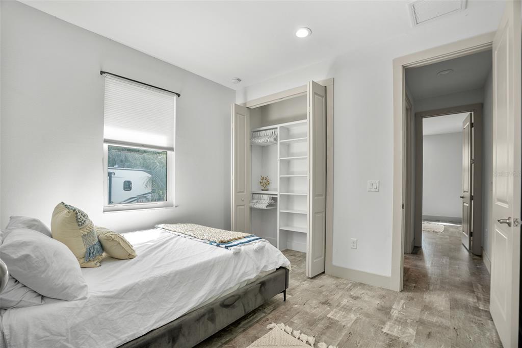 4528 Libby Road North Port, FL 34287 - Photo 29 of 43 a bedroom with a bed and a painting