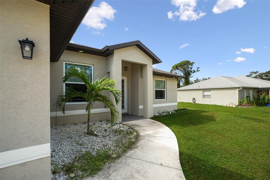4528 Libby Road North Port, FL 34287 - Photo 40 of 43 a house view with a garden space