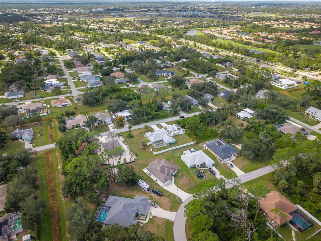 4528 Libby Road North Port, FL 34287 - Photo 41 of 43 an aerial view of residential houses with outdoor space