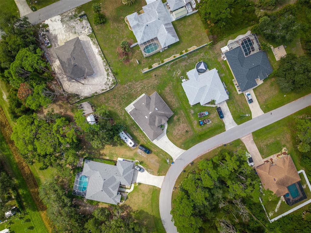 4528 Libby Road North Port, FL 34287 - Photo 43 of 43 an aerial view of a house with outdoor space and a lake view