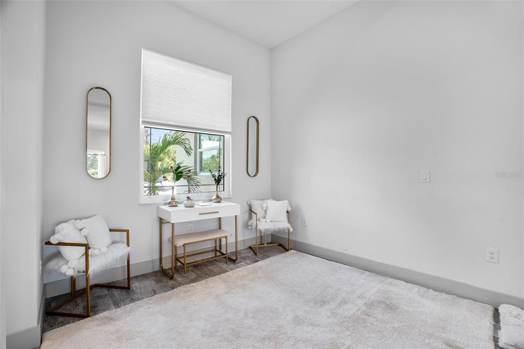 4528 Libby Road North Port, FL 34287 - Photo 9 of 43 a room with furniture and a window