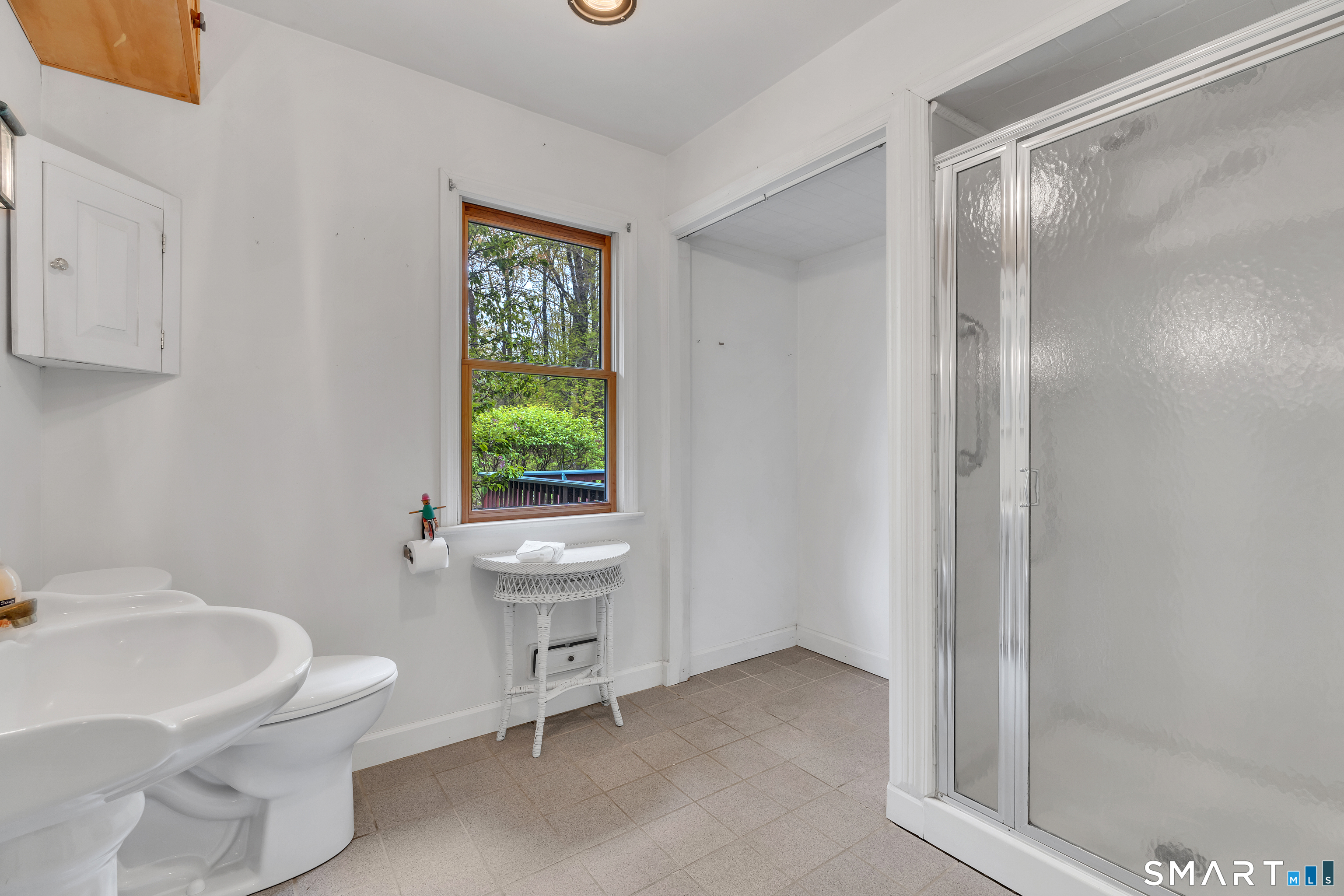 148 Old Redding Road Redding, CT 06896 - Photo 17 of 39 a bathroom with a sink toilet and shower