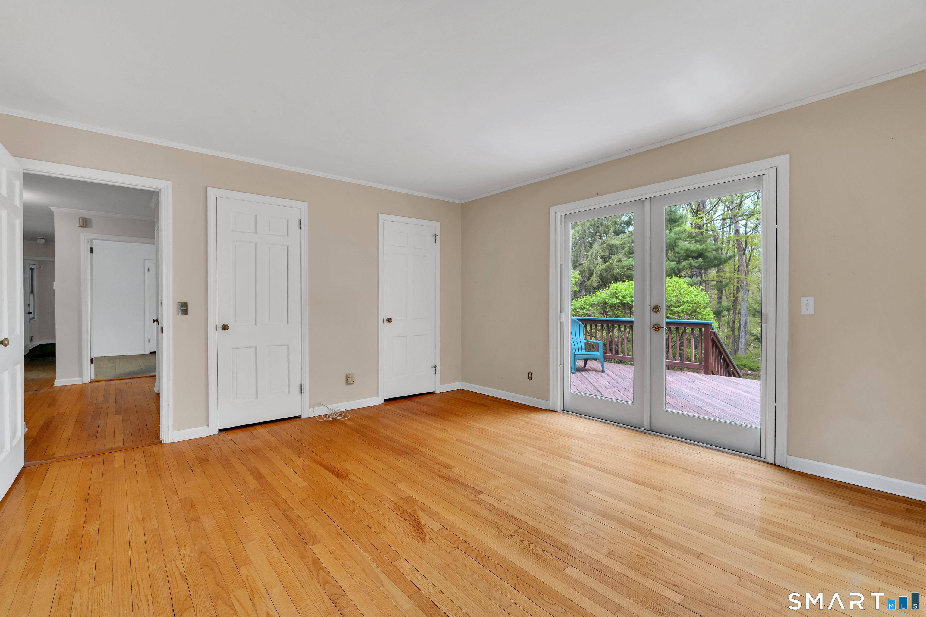 148 Old Redding Road Redding, CT 06896 - Photo 21 of 39 a view of empty room with wooden floor and fan