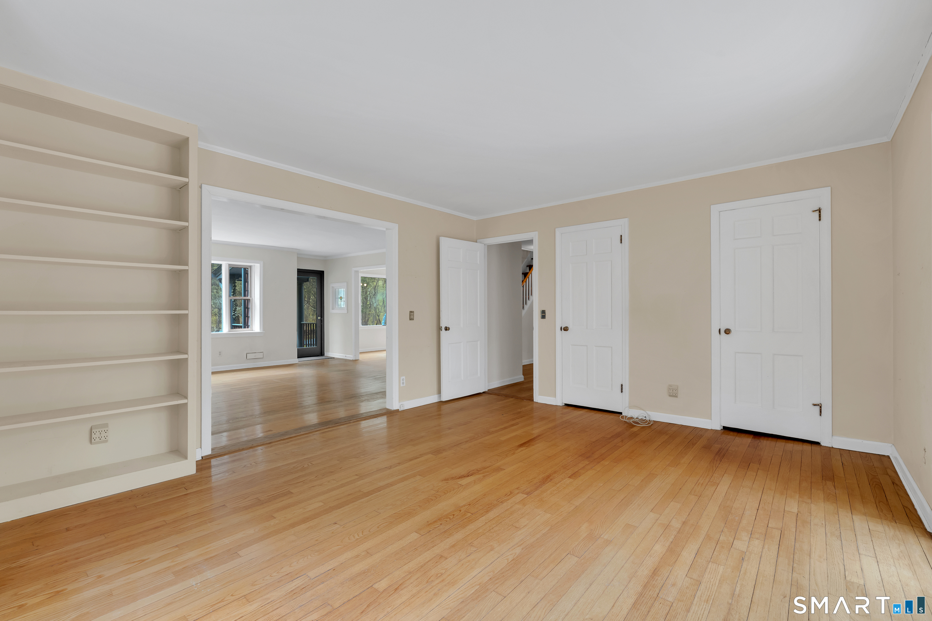 148 Old Redding Road Redding, CT 06896 - Photo 22 of 39 a view of empty room with wooden floor and fan
