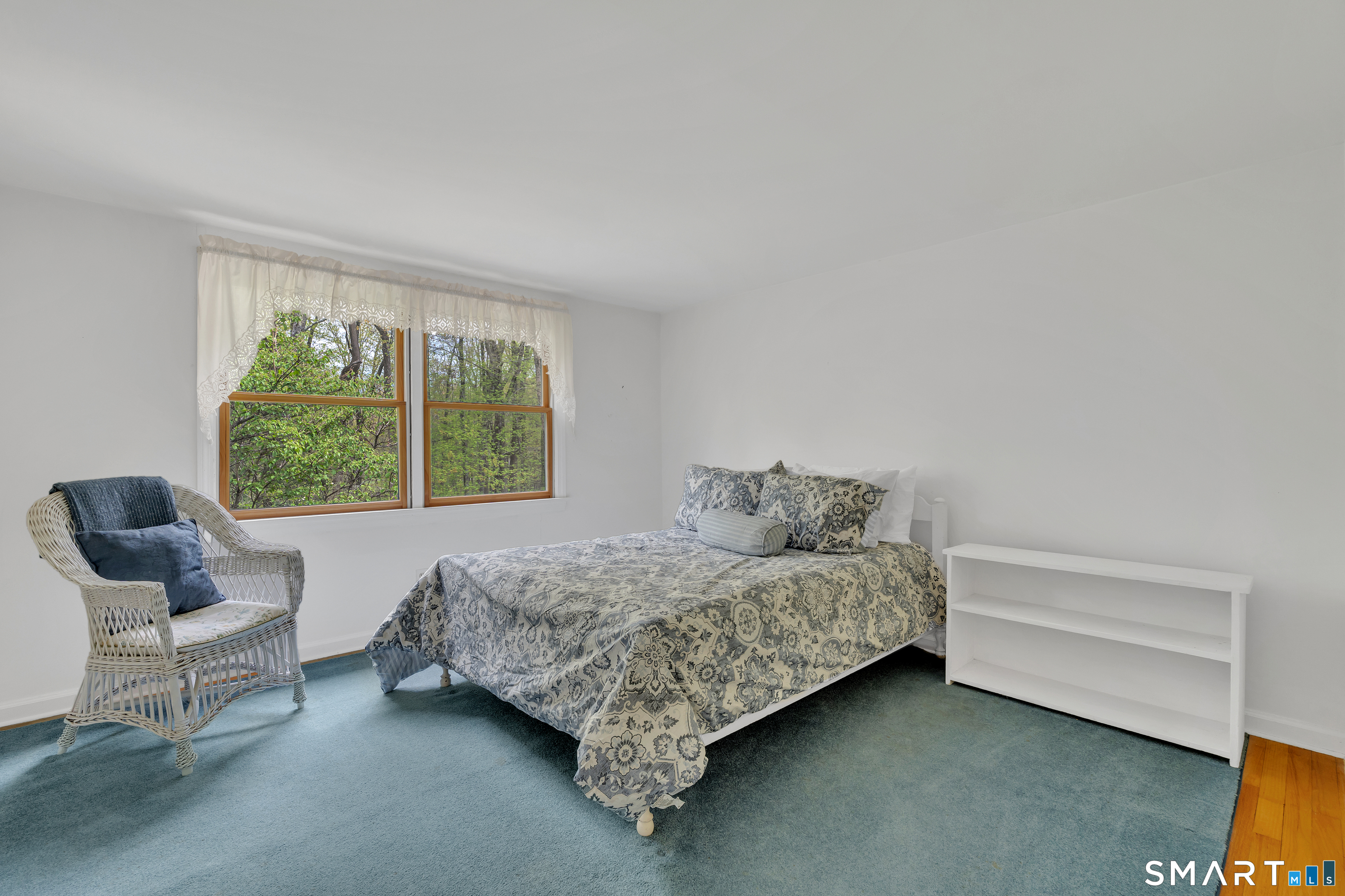 148 Old Redding Road Redding, CT 06896 - Photo 26 of 39 a bedroom with a bed chair and window