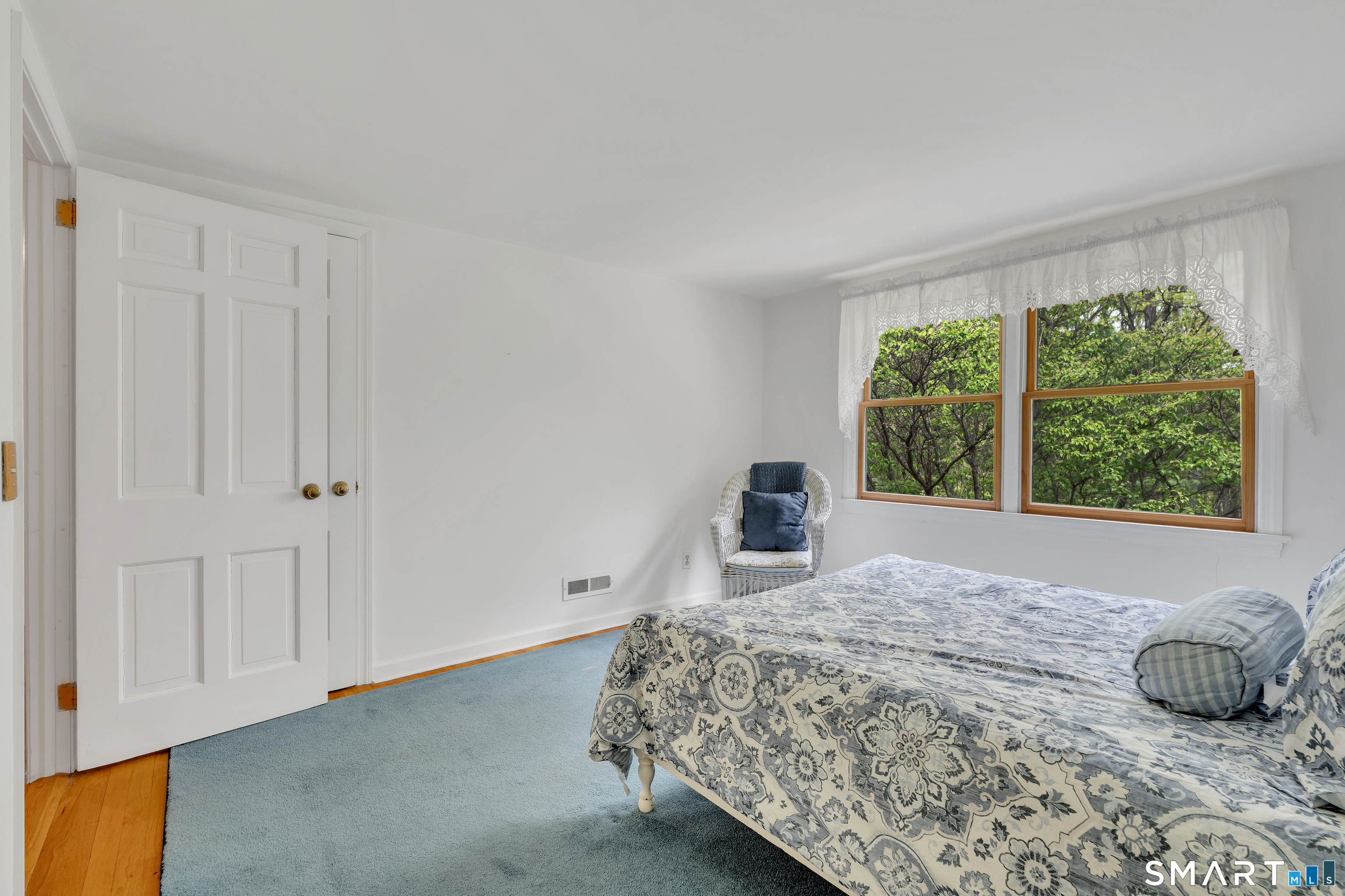 148 Old Redding Road Redding, CT 06896 - Photo 27 of 39 a bedroom with a bed and window