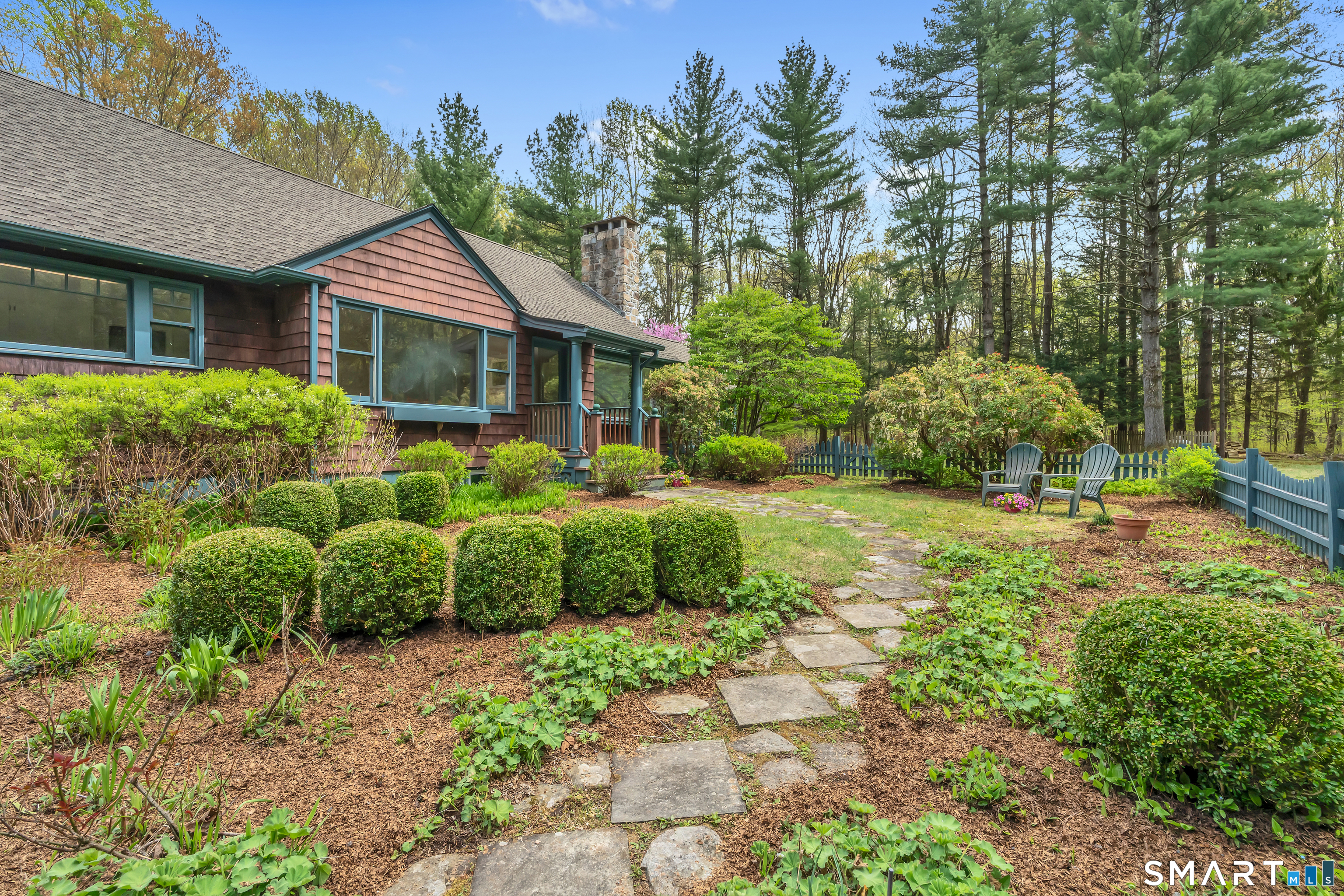 148 Old Redding Road Redding, CT 06896 - Photo 3 of 39 a front view of a house with garden