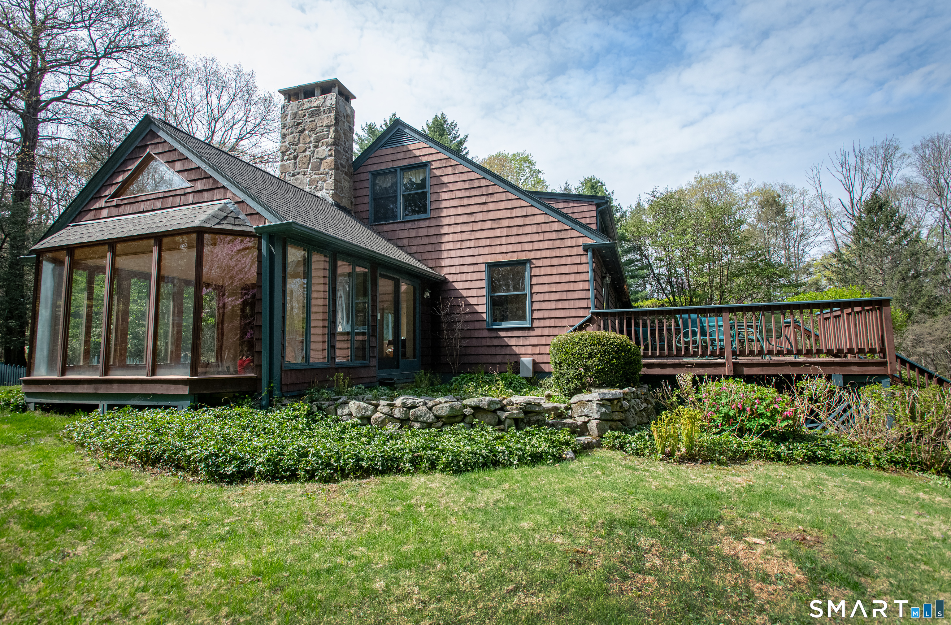 148 Old Redding Road Redding, CT 06896 - Photo 36 of 39 a front view of a house with a yard